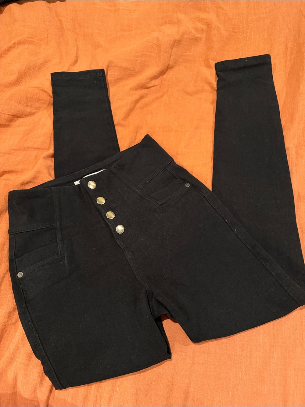 High-Waist Black Skinny Jeans with Button-Front Detail